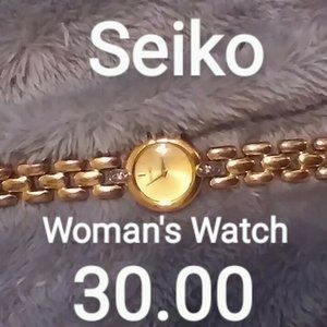 WOMANS STAINLESS STEEL WOMANS WATCH
